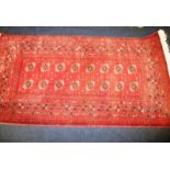 A vintage Afghan hand knotted wool rug, approx. size 100x200cm