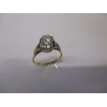 An 18ct gold & Palladium diamond solitaire ring, the stone measuring approx 6mm diameter