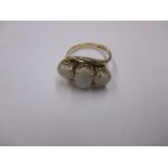 A 9ct gold ring set with 3 opals