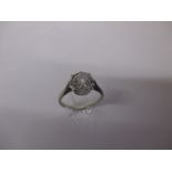 An 18ct white gold & platinum diamond solitaire ring the stone measuring approx 8mm diameter