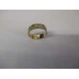 An 18ct gold band, approx. weight 4.4g