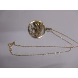 A 9ct gold necklace and Taurus pendant, approx weight 4.5g