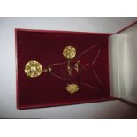 An 18ct yellow gold necklace and earring set, approx weight 14.2g