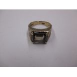 A 9ct gold ring set with a smokey quartz