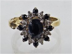 An 18ct Gold Diamond & Sapphire Ring