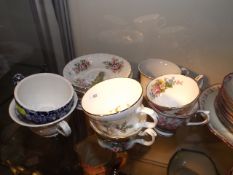 A Small Quantity Of Decorative Cups & Saucers