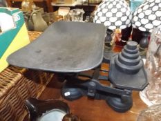 A Set Of Kitchen Scales With Weights