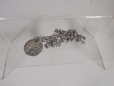 A Silver Chain & Pendant