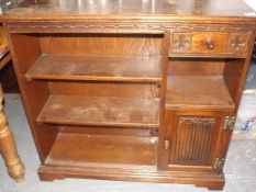 An Old Charm Oak Bookcase With Drawer & Cupboard