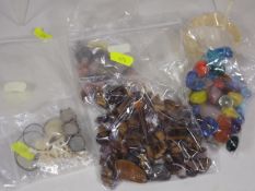 A Quantity Of Mixed Polished Stones Including Tige