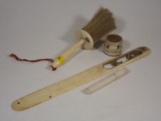 A 19thC. Ivory Handled Clothes Brush & Similar Ite