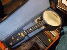 A Cased Vintage Banjo