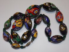 A Set Of Murano Style Beads