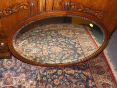 A Mahogany Framed Oval Mirror