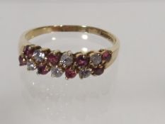 A 9ct Gold Ring With Pink & White Stones