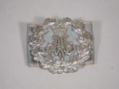 A White Metal Cap Badge