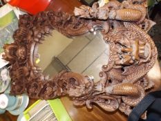 A Chinese Oriental Mirror With Carved Dragons Etc.
