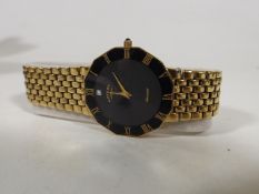 A Gents Gold Plated Wristwatch With Small Diamond