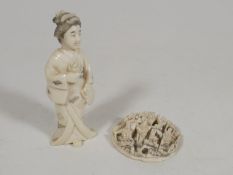 A C.1900 Japanese Carved Ivory Figure With Small F