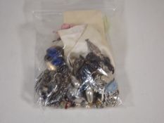 A Small Bag Of Costume Jewellery