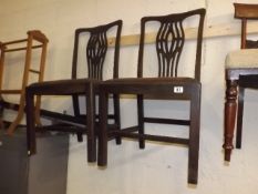 A Pair Of Two 19thC. Dining Chairs With Leather Se