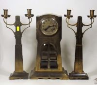 An Archibald Knox Style Clock Garniture Set