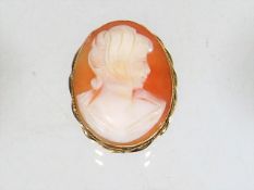 A Gold Mounted Cameo Of Young Woman