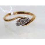 An 18ct Gold Ring With Three Diamonds