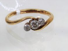 An 18ct Gold Ring With Three Diamonds