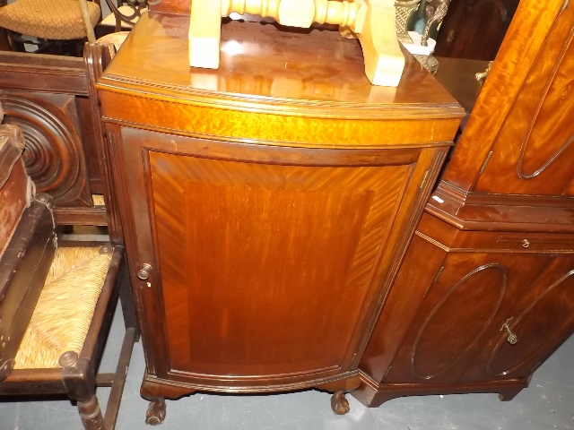 A Mahogany Cupboard With Convexed Door & Claw Feet