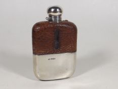A Silver Cased Drinking Flask