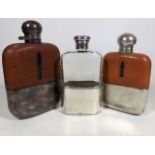 Three Antique Drinking Flasks, Two With Silver Top