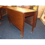 A Georgian Gate Leg Table With Tapered Legs & Bras