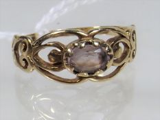 An Antique 9ct Gold Ring With Lilac Stone