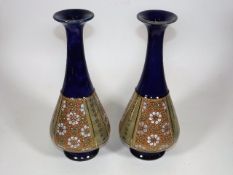 A Pair Of Doulton Stoneware Vases 11in, chip to fo