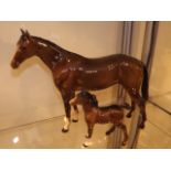 A Beswick Mare With Foal