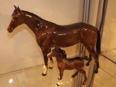 A Beswick Mare With Foal