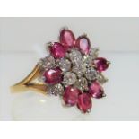 A 9ct Gold Ring Set With Rubies & Diamonds