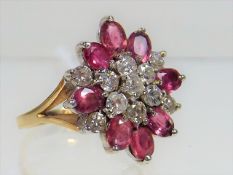A 9ct Gold Ring Set With Rubies & Diamonds