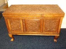 An Anglo Indian Carved Coffer On Legs