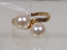 A Yellow Metal Pearl Ring