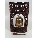 An Tibetan Bell & Carved Stand
