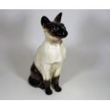 A Large Fireside Beswick Siamese Cat