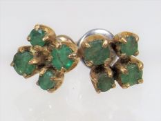 A Set Of Gold Emerald Earrings