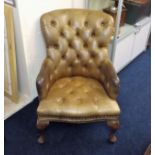 An Antique Button Back Leather Nursing Chair