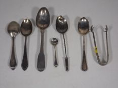 A Small Set Of Silver Tongs & Six Odd Silver Spoon