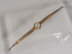 A Ladies 9ct Gold Tissot Wristwatch