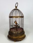 A German Brass Bird Cage With Clockwork Bird