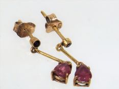 A Set Of Gold Ruby Set Pendant Earrings
