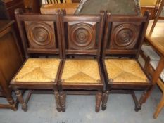 A Set Of Six 19thC. Oak Rush Seat Farmhouse Chairs